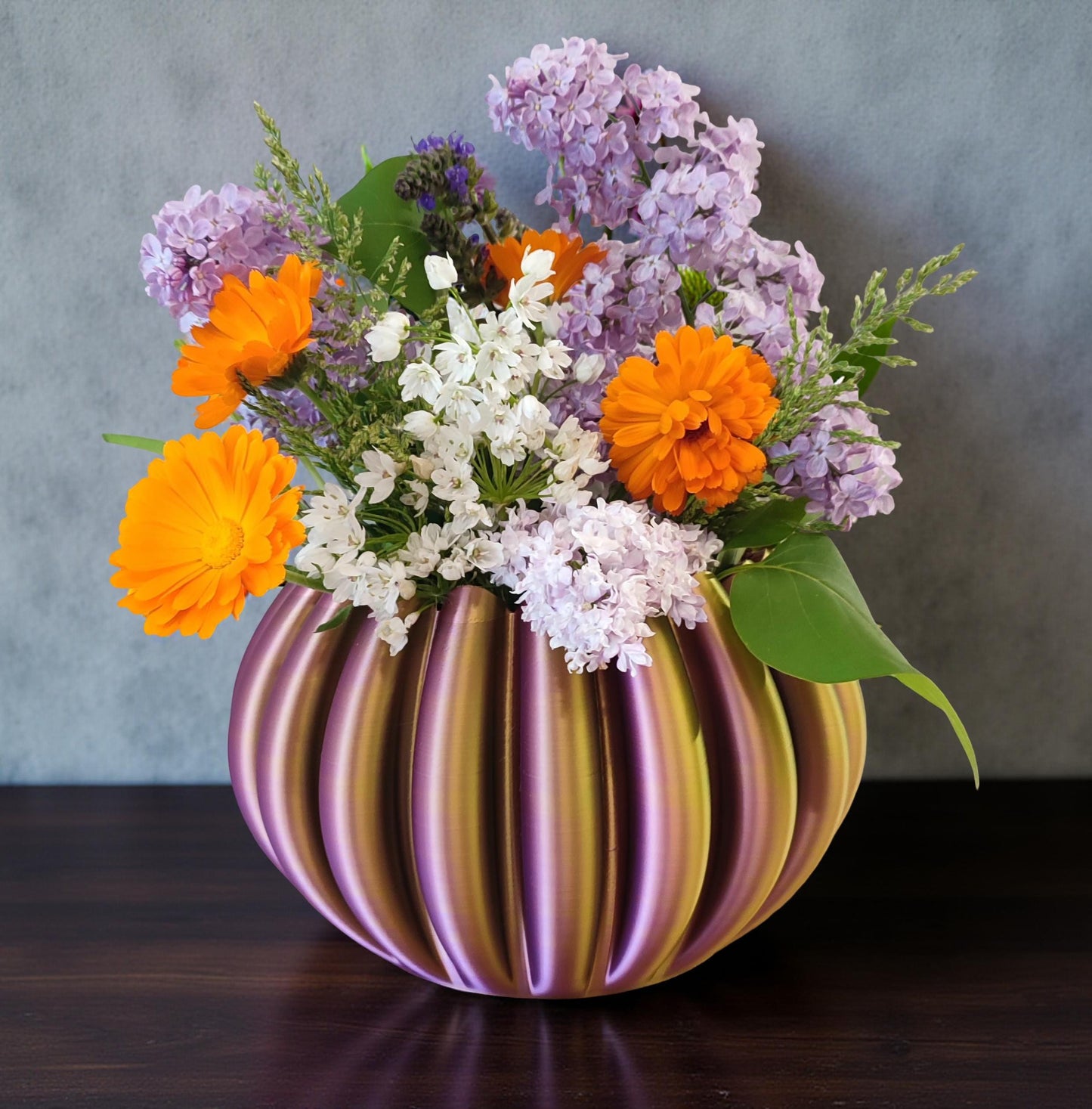 Modern, roomy, multi-coloured vase with gradual gold, purple, green, blue shading