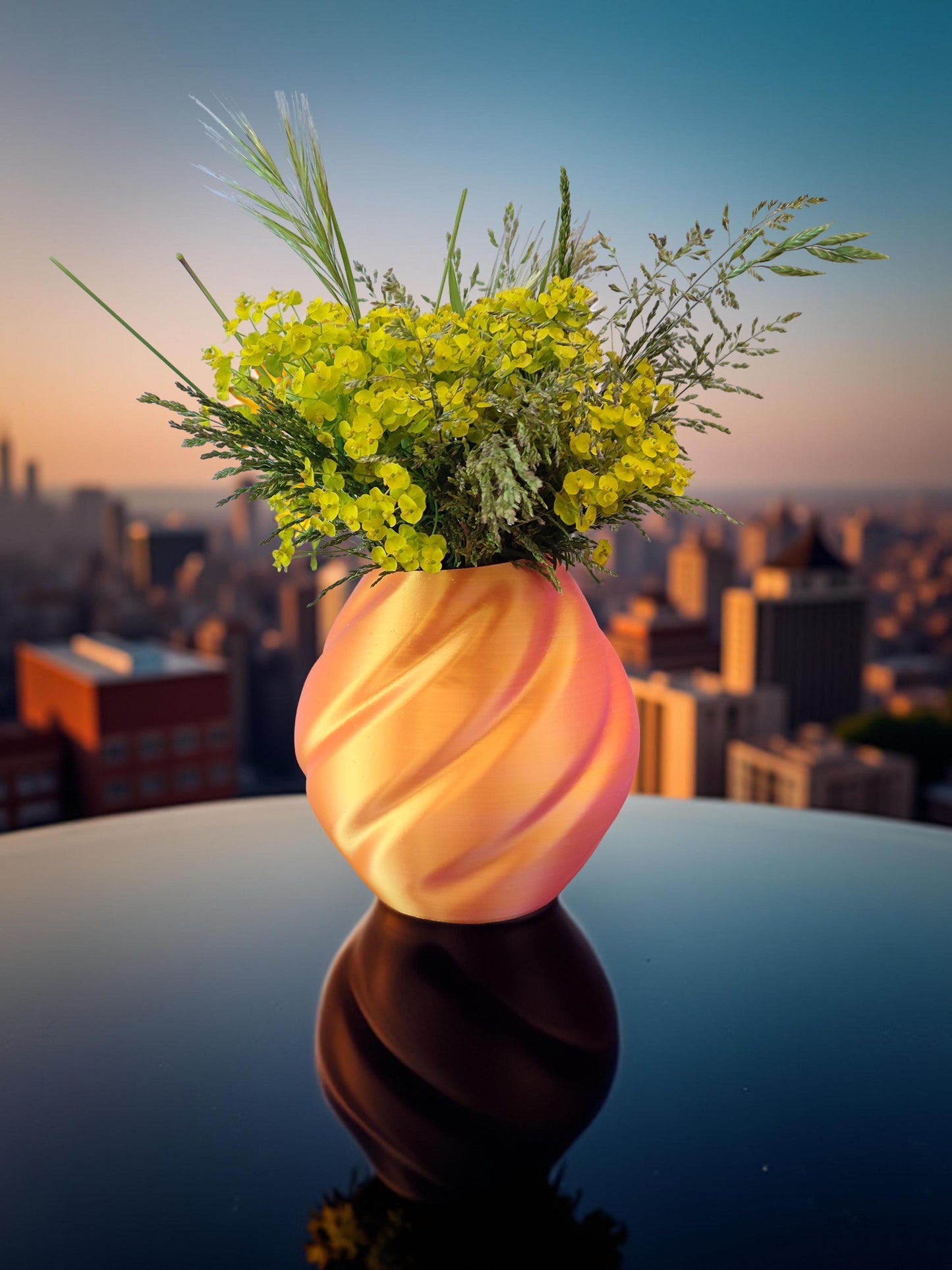 Modern, roomy vase, color with gradual pink-orange shading.