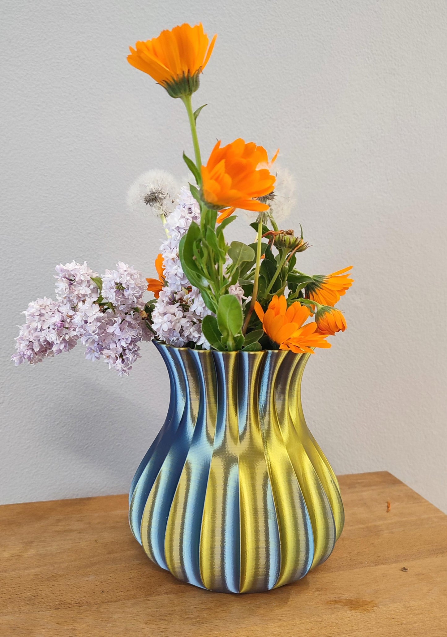 Modern, roomy, multi-coloured gold - black vase