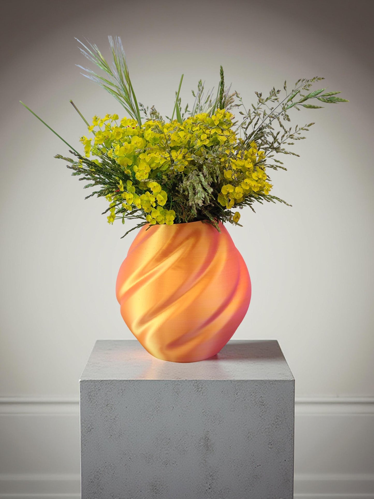 Modern, roomy vase, color with gradual pink-orange shading.