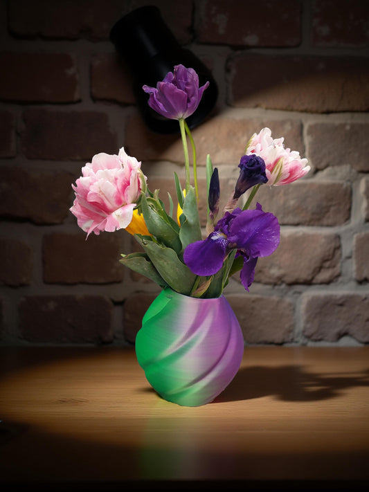 Modern, roomy, whimsical, green, blue and purple vase.