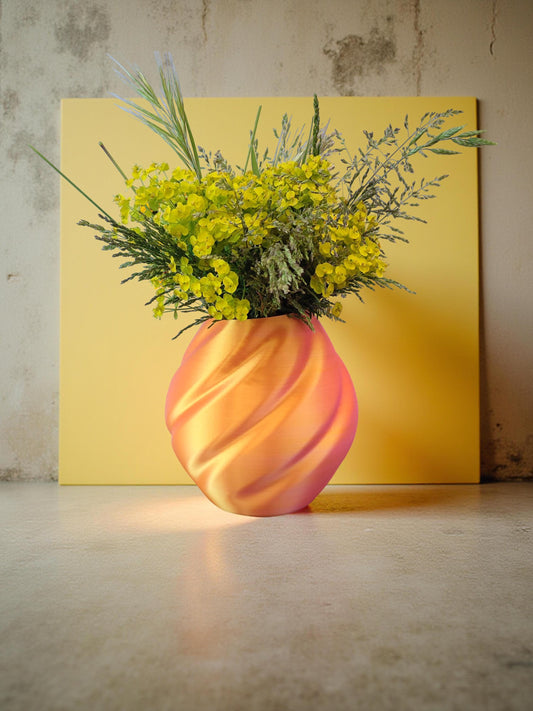Modern, roomy vase, color with gradual pink-orange shading.