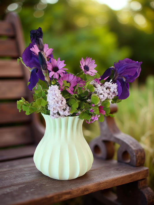 Modern, roomy vase, pastel light green color.