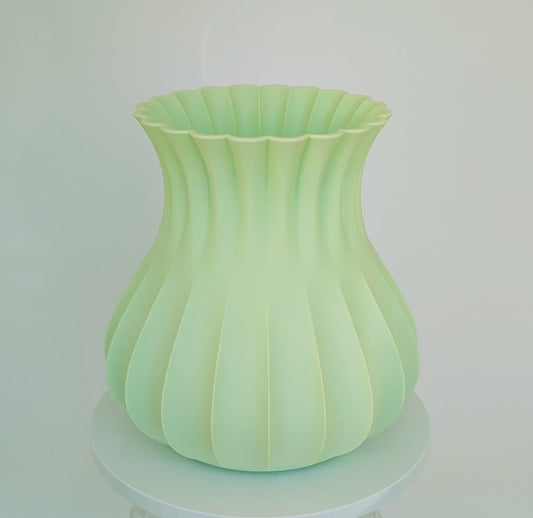 Modern, roomy vase, pastel light green color.