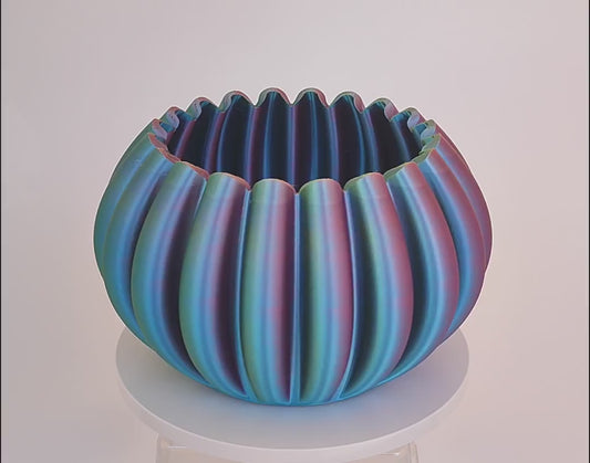 Modern, roomy, multi-coloured vase with gradual gold, purple, green, blue shading